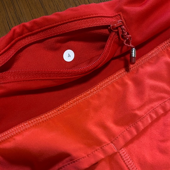 Lululemon Shorts • Size 4 • Two toned, red and orange/pink with back zipper - Picture 8 of 10